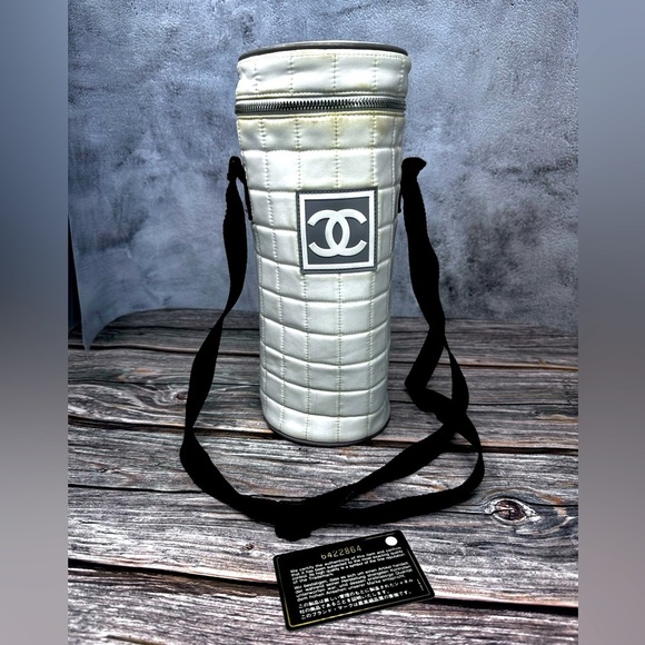 CHANEL Handbags - CHANEL Sports Line Bottle Holder White Shoulder Bag Cylindrical GUC​